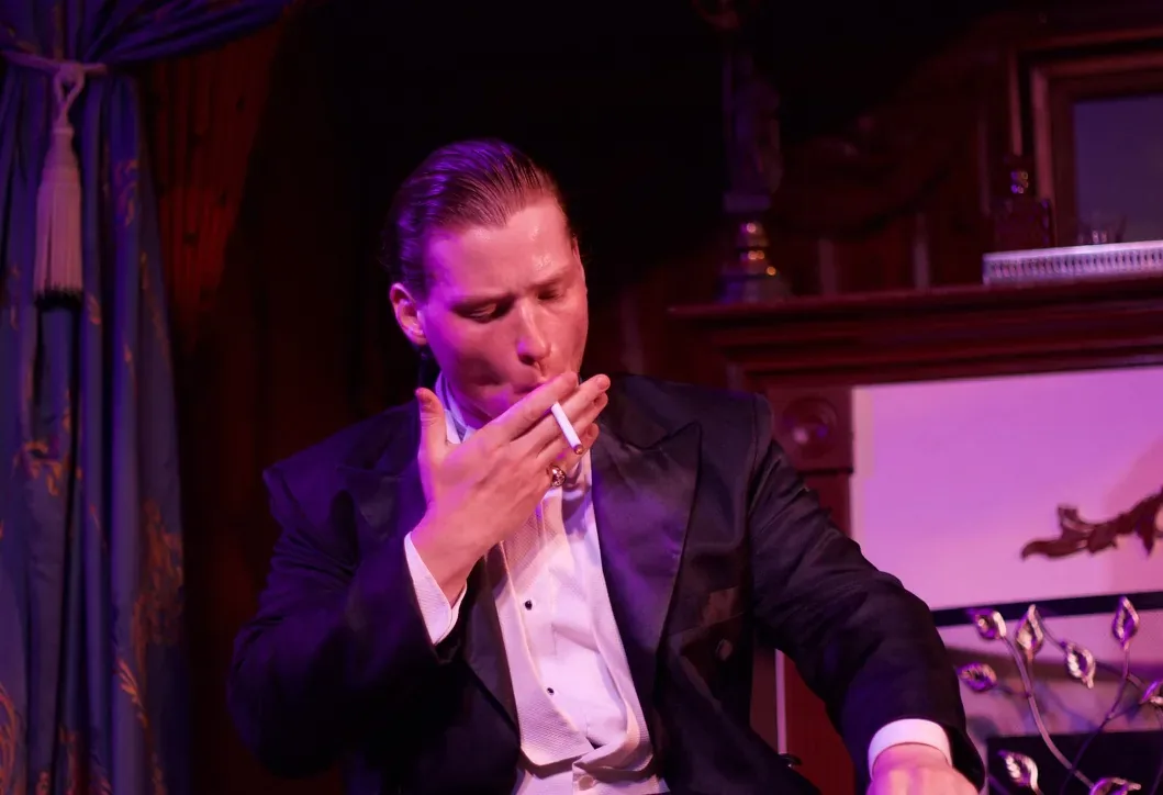 Nimrod Endvelt as Arthur Birling in a tense moment